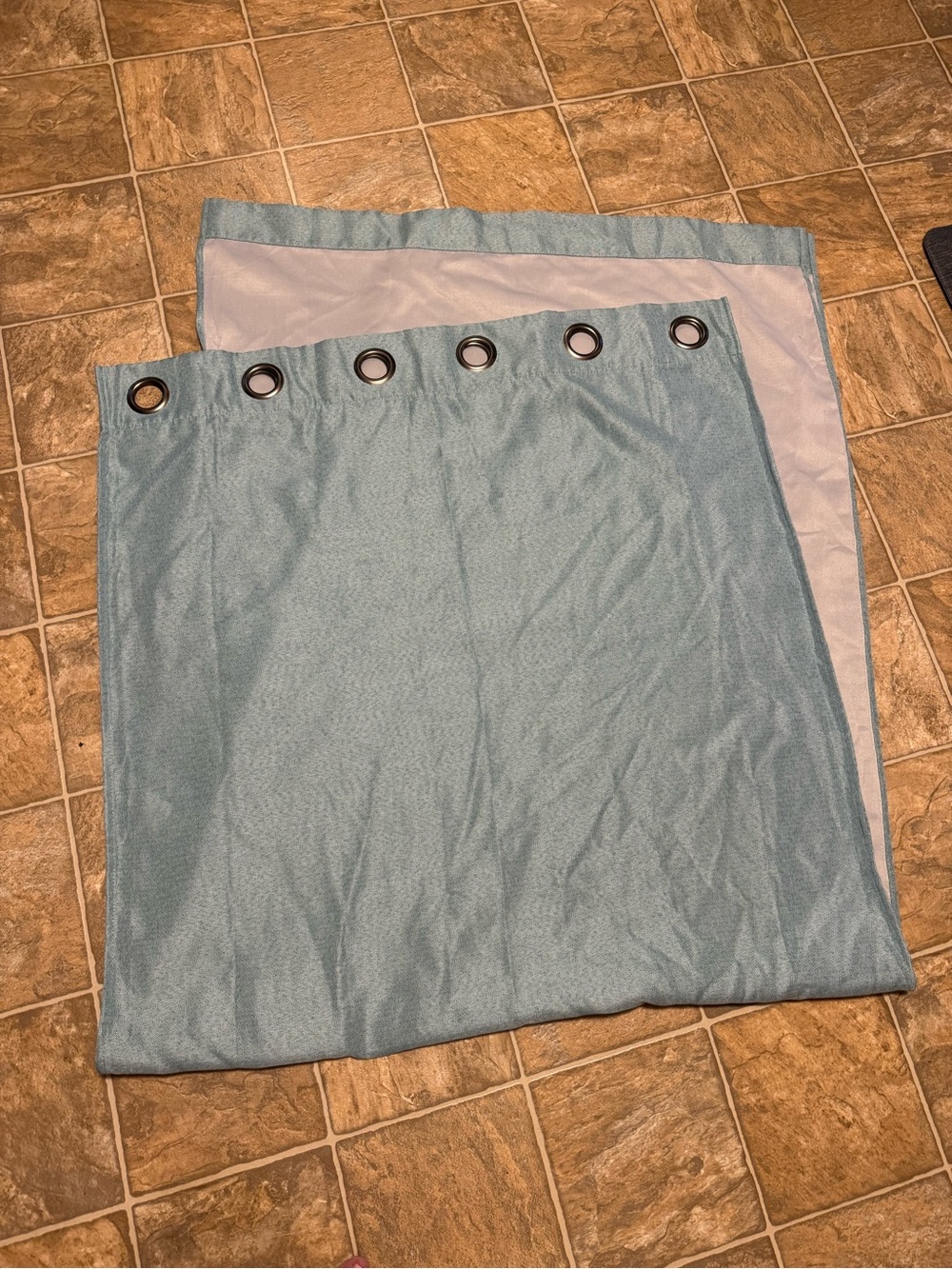 At home light blue curtains